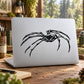 Stalking spider decal with black spider silhouette on light surface