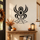 Black spider and web wall decal, large spider silhouette with web lines.