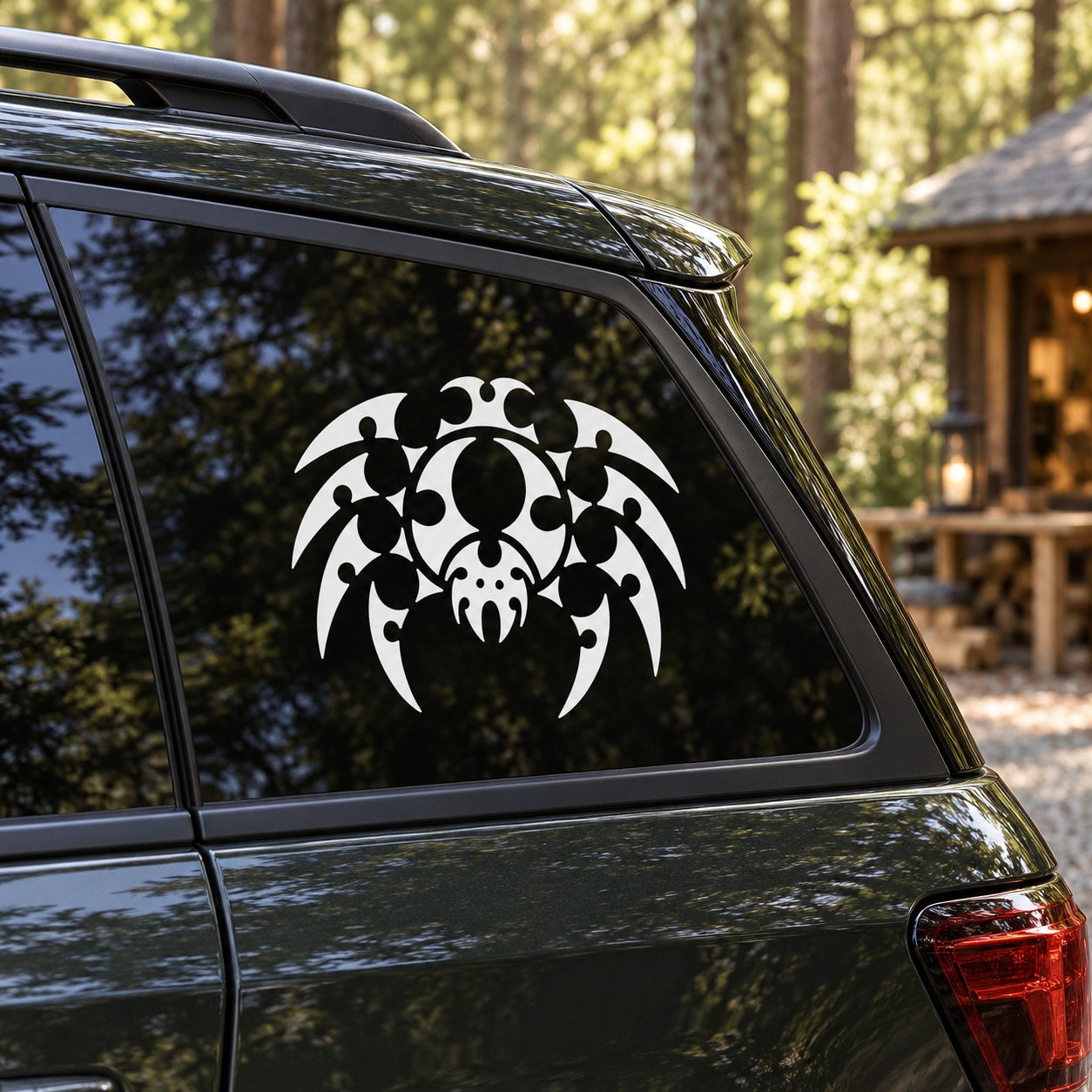 Bubble-style spider window decal with white spider and web pattern