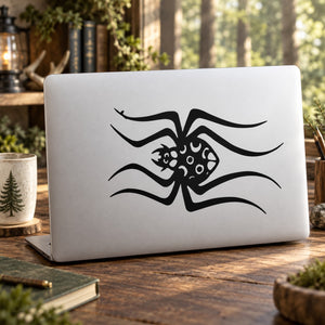Black spider decal with detailed webbed legs on a white backing