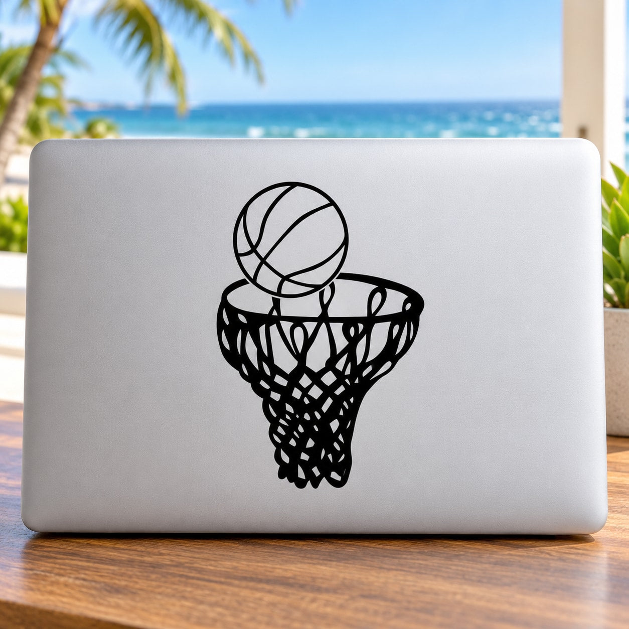 Basketball net and ball decal, black hoop outline on light surface