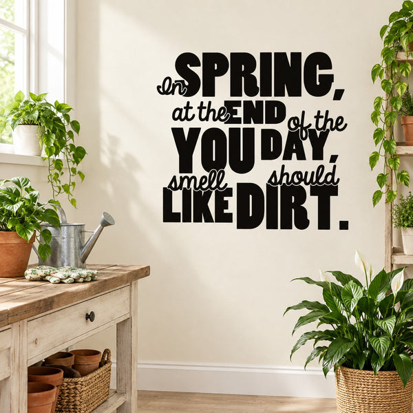 Black wall decal with quote text: “SPRING…smell LIKE DIRT”.