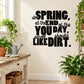Black wall decal with quote text: “SPRING…smell LIKE DIRT”.