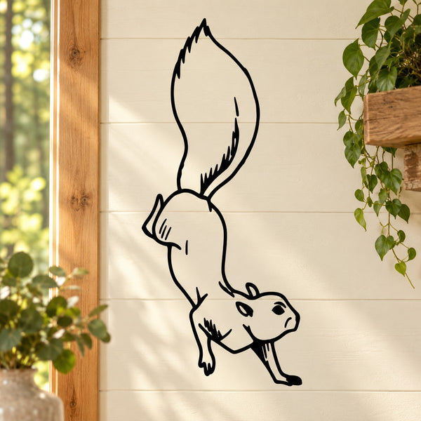 Landing squirrel wall decal, black outline on light surface