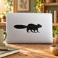 Black squirrel silhouette decal on white surface