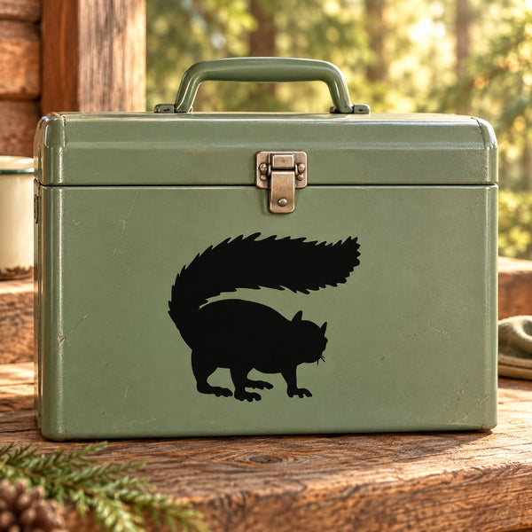 Black squirrel silhouette decal on green suitcase case