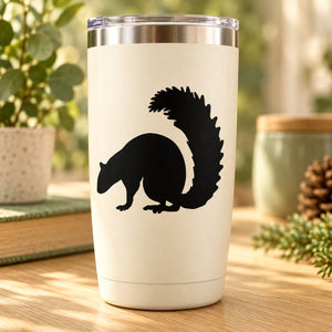 Sniffing squirrel decal in black on a light tumbler