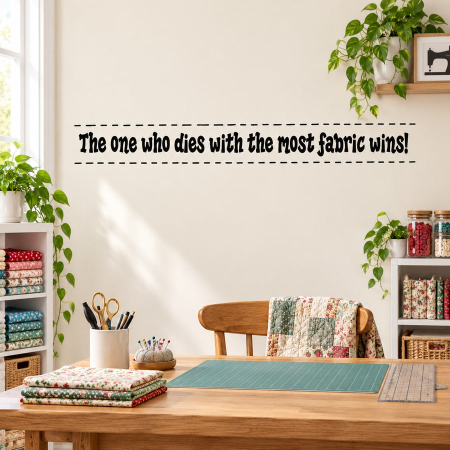 Wall decal with quote: 'The one who dies with the most fabric wins!'