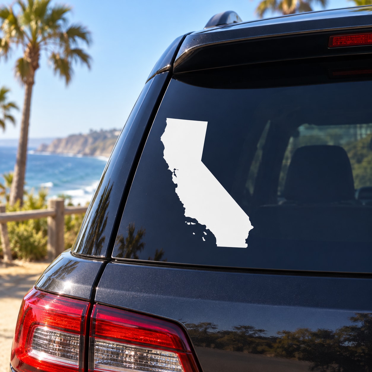 California state decal: white California silhouette on car rear window