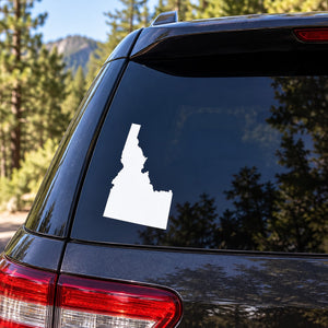 Idaho state silhouette decal on dark car rear window