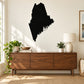 Maine state decal with dark silhouette of Maine shape