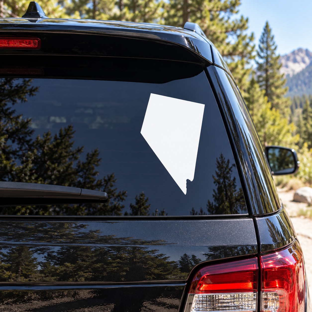 Nevada state decal: white state outline on car window
