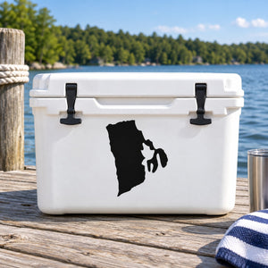 Black Rhode Island state silhouette decal on a white cooler