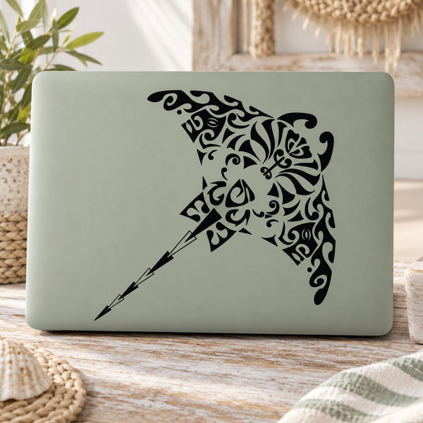 Intricate stingray decal with black ornamental scrollwork on light gray sheet