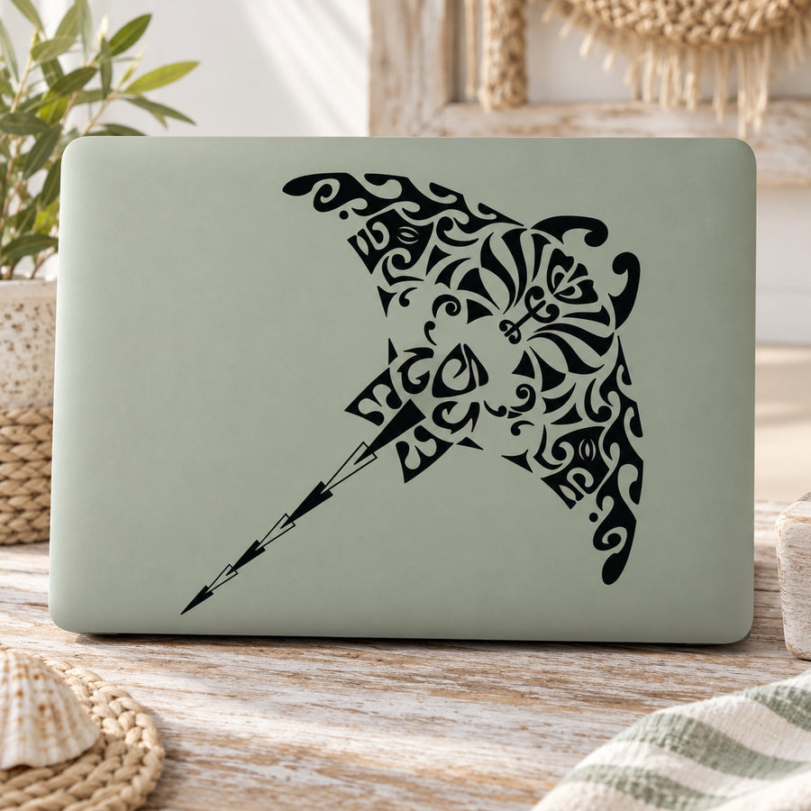 Intricate stingray decal with black ornamental scrollwork on light gray sheet