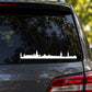 White skyline car window decal with Stockholm-style building silhouettes