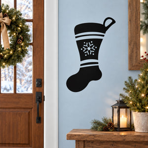 Black Christmas stocking decal with white stripe and snowflake on light blue door