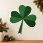 Three-leaf clover sticker with dark green leaves and a ribbon tail