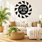 Black sunburst wall decal with white text: SOAK UP THE SUN