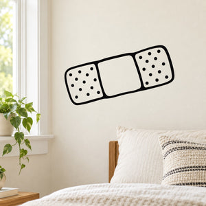 Bandage outline decal sticker with black border and dotted pads
