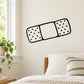 Bandage outline decal sticker with black border and dotted pads