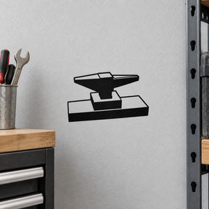 Anvil tilted left decal with black outlined anvil icon and solid base shape