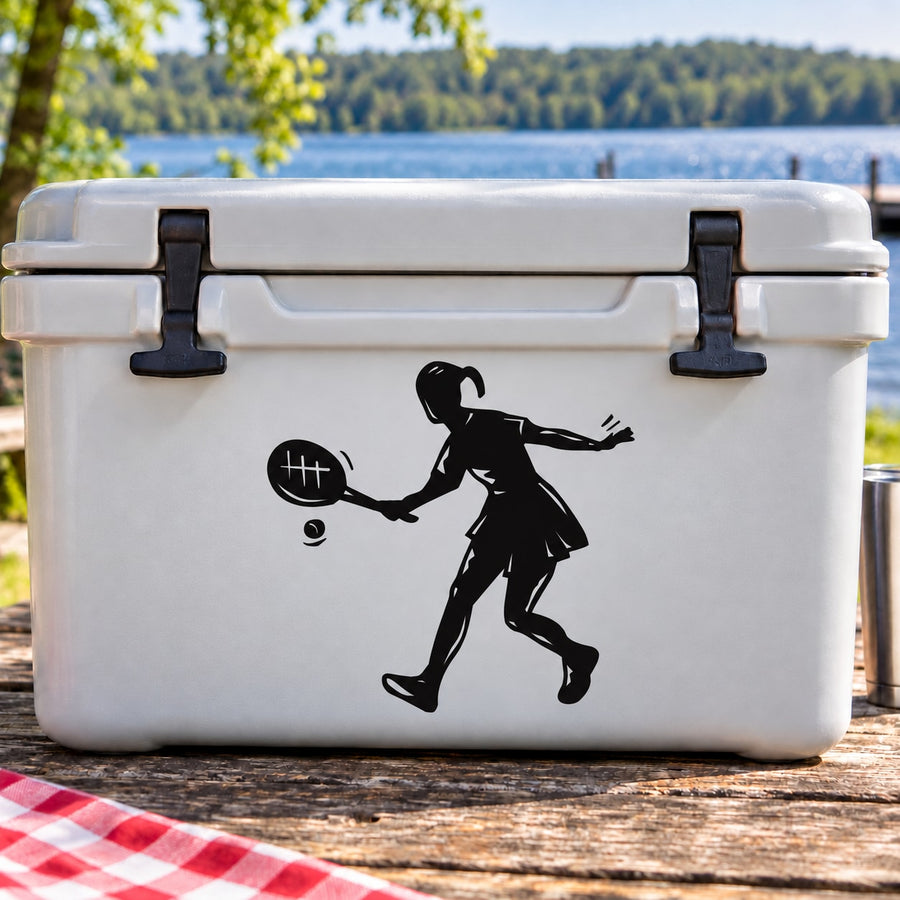 Black vinyl wall decal of a girl tennis player with racket and ball silhouette