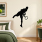 Black tennis player wall decal silhouette holding racket on plain wall