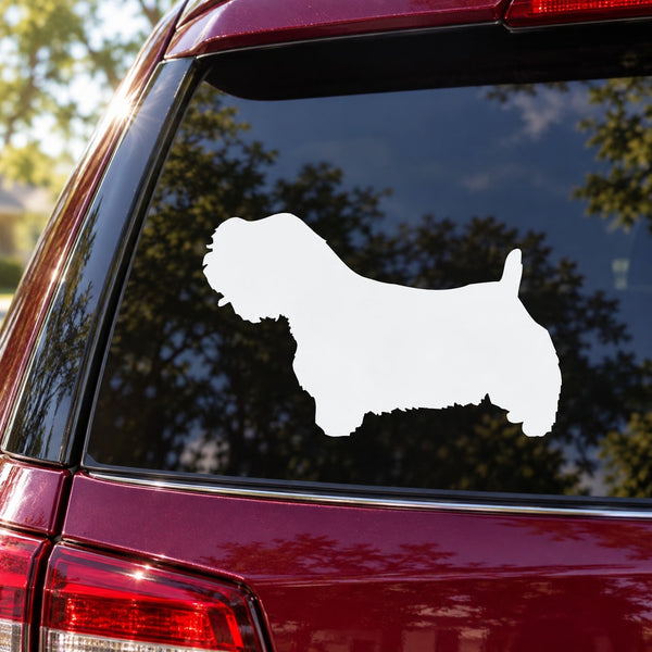 Sealyham Terrier decal with a simple white dog silhouette on a car window
