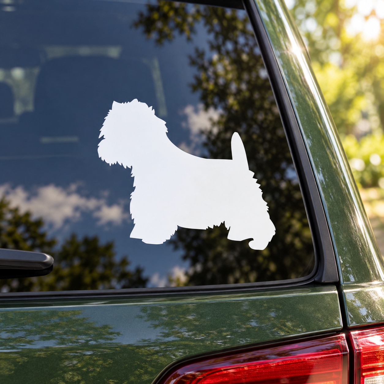 White West Highland White Terrier vinyl decal silhouette on a car window