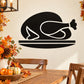 Black cooked turkey decal with white outline on a serving platter