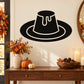 Black dripping flan-style hat wall decal with white outline