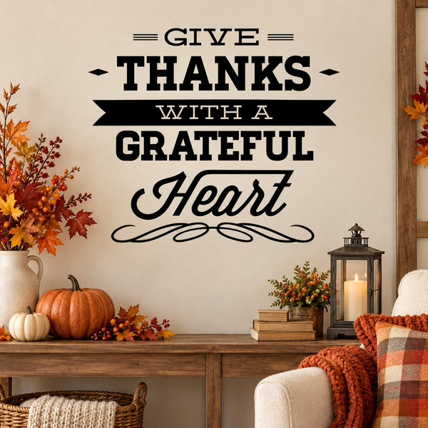 Thanksgiving typography wall decal reading “Give Thanks With a Grateful Heart” in black