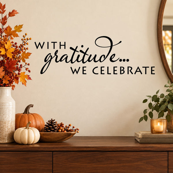 Thanksgiving gratitude wall decal with 'WITH gratitude... WE CELEBRATE' in black script
