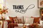 Thanksgiving vinyl wall decal reading “Thanks Lord” in black lettering