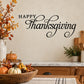 Happy Thanksgiving wall decal with elegant script lettering and autumn leaf accents