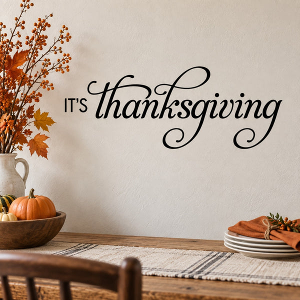 Thanksgiving wall decal with black script text "It's Thanksgiving"