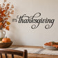 Thanksgiving wall decal with black script text "It's Thanksgiving"