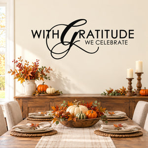 Thanksgiving wall decal with black script text: With Gratitude We Celebrate