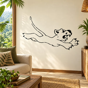 Cartoon tiger pouncing wall decal in black outline, tail and paws extended