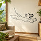Cartoon tiger pouncing wall decal in black outline, tail and paws extended