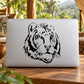 Tiger head decal sticker in black ink on a light surface