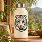 Tiger face decal on cream water bottle