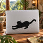 Stretching cat silhouette decal for laptop, black on light background