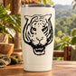 White tumbler with black aggressive tiger head decal and clear lid