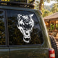 White tiger head decal on car side window, fierce snarling face design