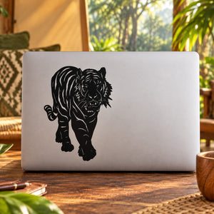 Black tiger decal on light laptop-style surface