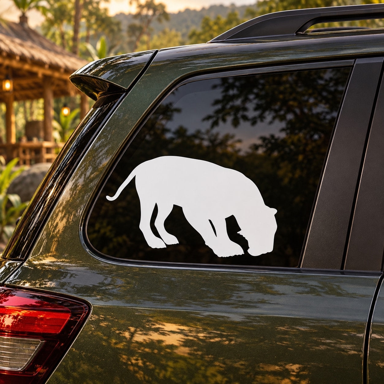 Tiger sniffing decal with white tiger silhouette on a car window