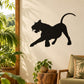 Black tiger silhouette wall decal in defensive stance, tail raised