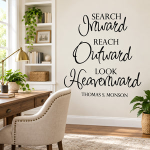 Black wall decal text: Search inward, reach outward, look heavenward—Thomas S. Monson
